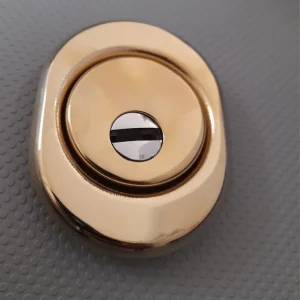 Merkproduct Defender per cilindri sagomati oro PVD 17536