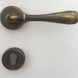Maniglia per porta modello Novecento - GHIDINI BRONZO FORO YALE 7062y Lage Kosten